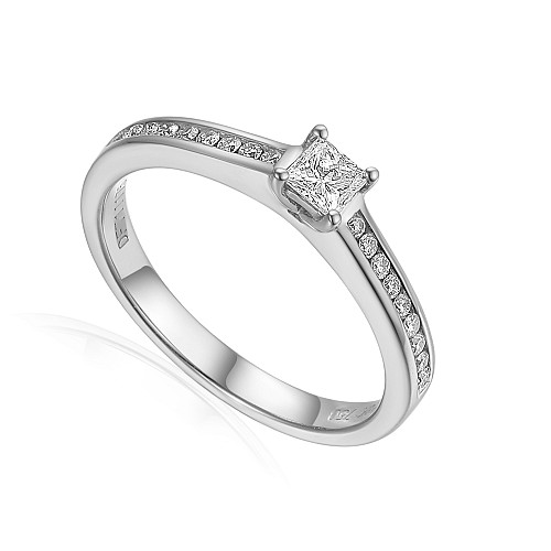 Claw Set Princess Cut Diamond Solitaire With Round Brilliant Cut Channel Set Shoulders Ring