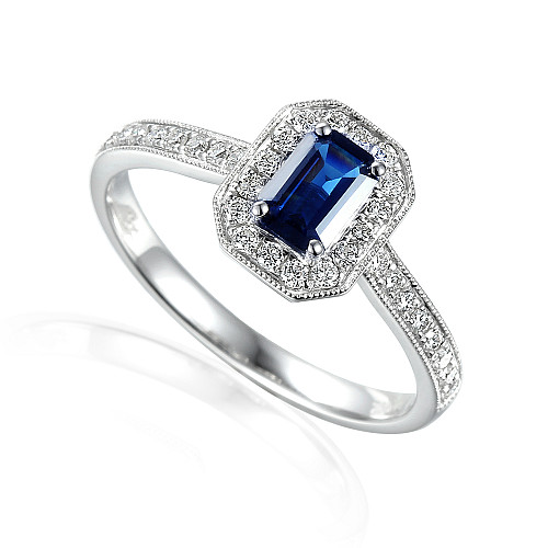 Claw Set Emerald Cut Blue Sapphire With Round Brilliant Diamond Halo & Shoulders Ring