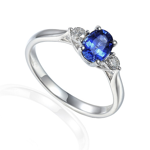 Claw Set Oval Cut Blue Sapphire & Round Brilliant Cut Diamond 3 Stone Ring