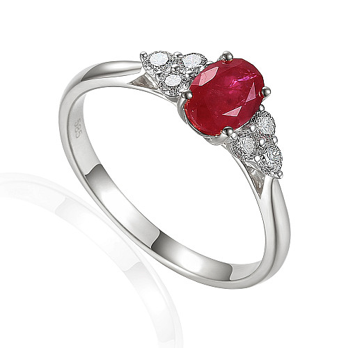 Oval Cut Ruby Claw Set With Round Brilliant Cut Diamond Trefoil Ring