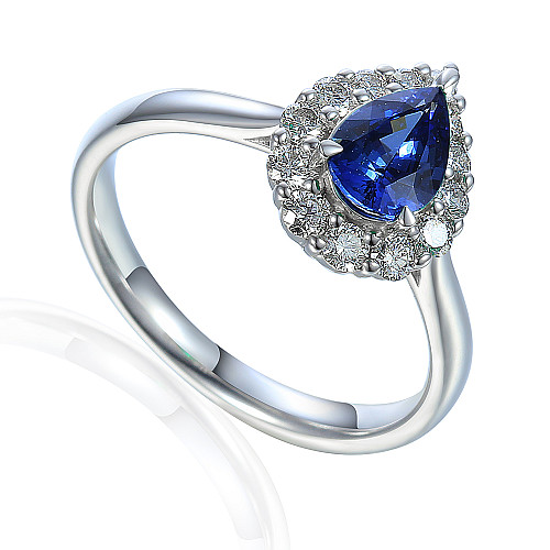 Claw Set Pear Shape Cut Blue Sapphire With Round Brilliant Diamond Halo Ring