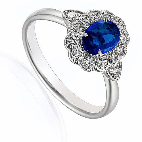 Claw Set Oval Cut Blue Sapphire With Round Brilliant Diamond Halo & Milgrain Ring