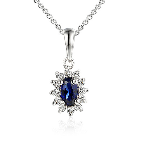 Claw Set Oval Cut Blue Sapphire And Round Brilliant Cut Diamond Cluster Pendant And Chain