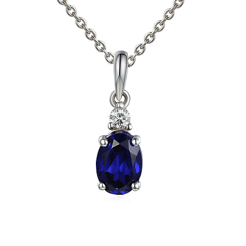 Oval Cut Garnet with Round Brilliant Cut Diamond Claw Set Drop Pendant