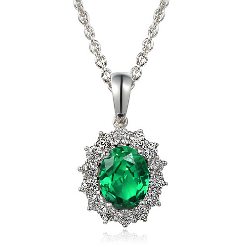 Claw Set Oval Shape Cut Emerald With Round Brilliant Cut Diamond Halo Cluster Pendant And Chain