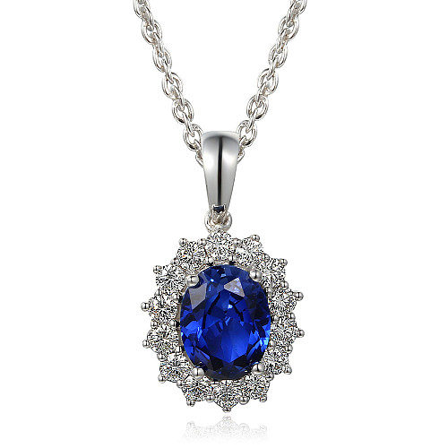 Claw Set Oval Shape Cut Blue Sapphire With Round Brilliant Cut Diamond Halo Cluster Pendant And Chain