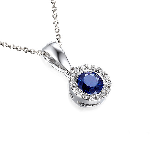 Rubover Set Round Brilliant Cut Blue Sapphire And Micro Set Diamond Halo Pendant And Chain