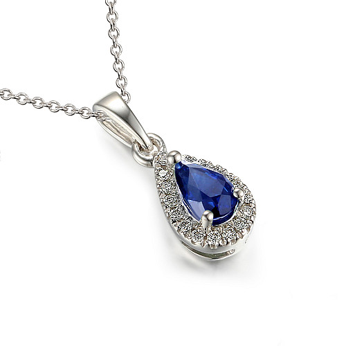 Claw Set Pear Shape Cut Blue Sapphire With Round Brilliant Cut Diamond Halo Pendant And Chain
