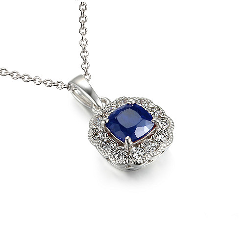 Claw Set Cushion Cut Blue Sapphire And Round Brilliant Cut Diamond Halo Pendant And Chain