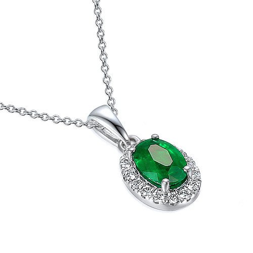 Claw Set Oval Cut Emerald With Micro Set Diamond Halo Pendant And Chain