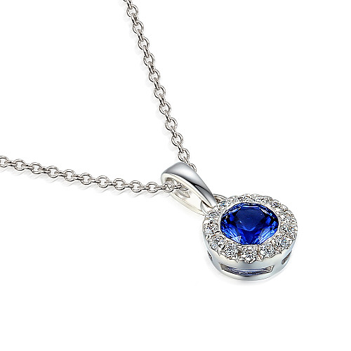 Rubover Set Round Brilliant Cut Blue Sapphire With Micro Set Diamond Halo Pendant And Chain