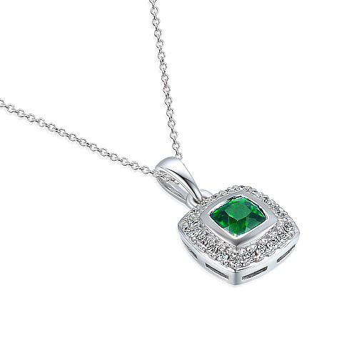 Rubover Set Cushion Cut Emerald With Micro Set Round Brilliant Cut Diamond Halo Pendant And Chain