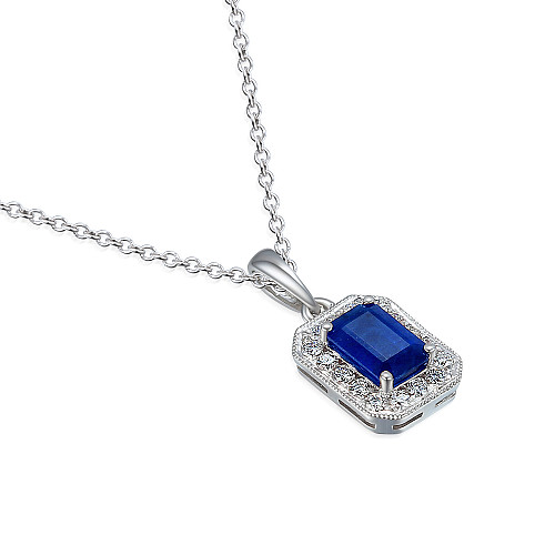 Claw Set Emerald Cut Blue Sapphire With Micro Set Diamond Halo Pendant And Chain